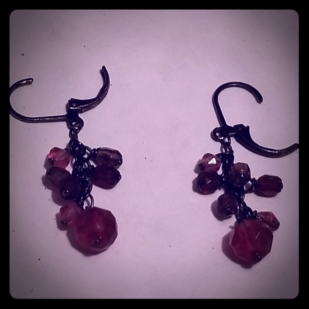 Pair of red dangling earrings